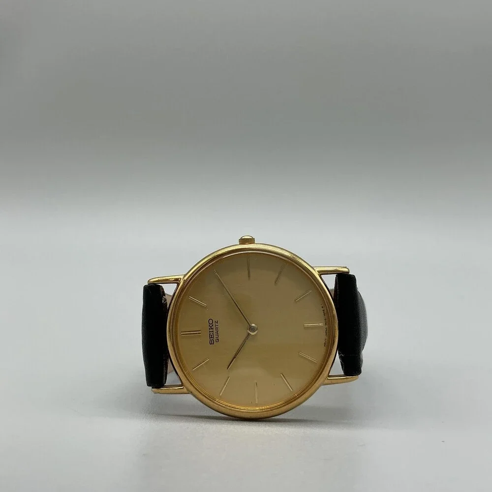 Vintage Seiko Mens Watch 31mm Gold Tone Black Leather 7N00-7A49 New Battery
